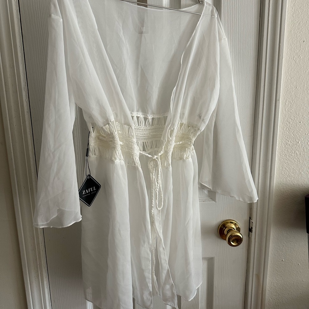 White swimsuit cover up